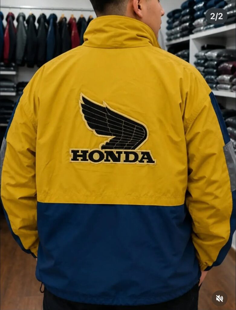 campera de moto amarilla y negra